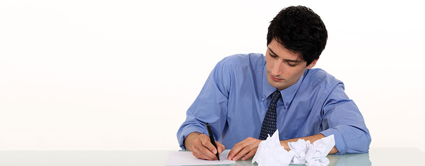 Young Man Revising His Essay